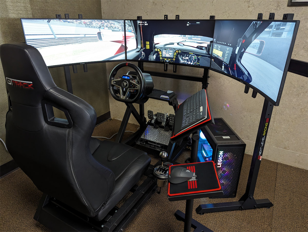 Three gaming computer setups with RGB lights glowing from them