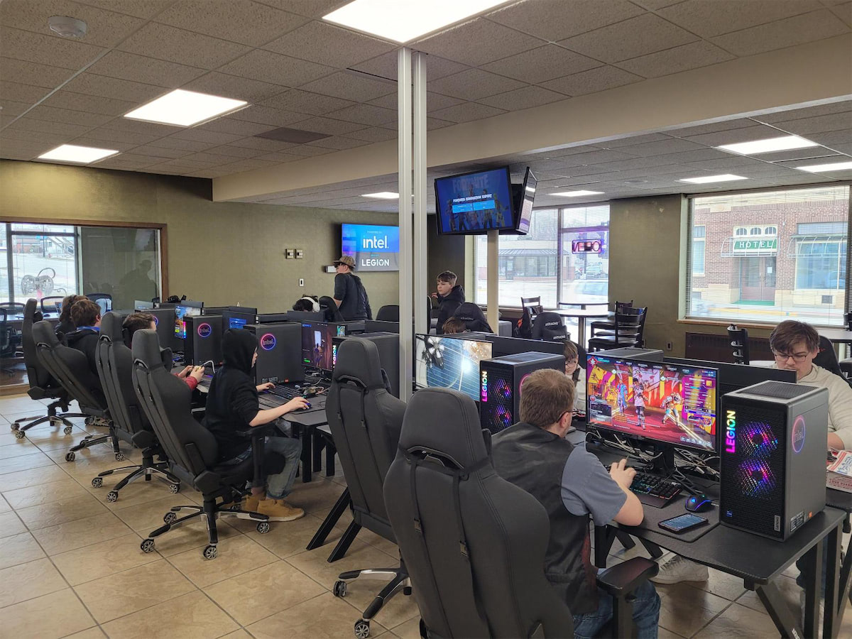 Three computer gaming setups side by side